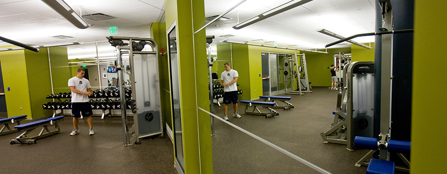 Person using equipment in a fitness center