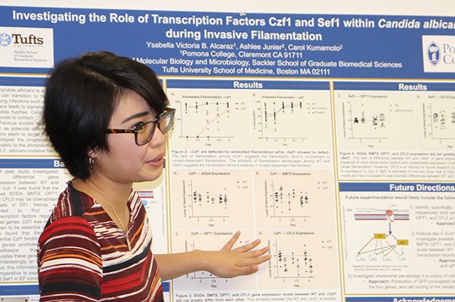 student presenting a poster