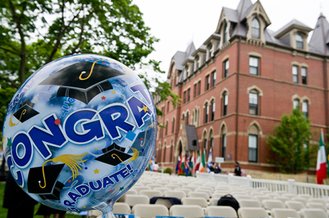 a balloon in front of an outdoor commencement